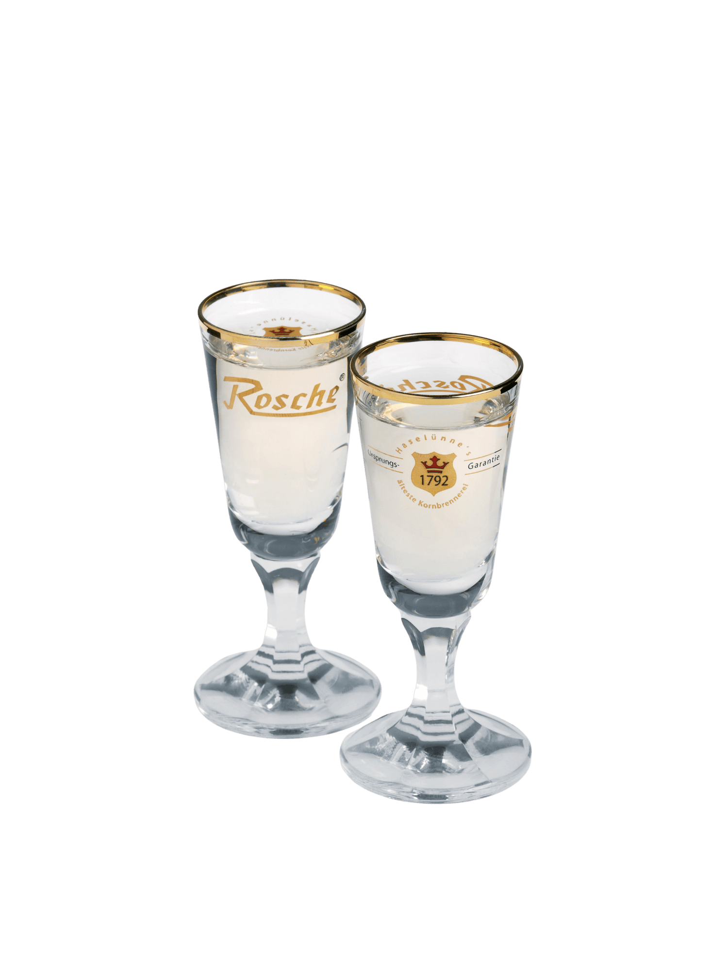 Zwei Rosche Club Gläser mit goldenen Rändern gefüllt mit klarem Getränk Kornbrand