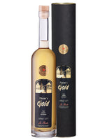 Flasche Rheine's Gold Kräuter-Spirituose 30% vol neben schwarzer Geschenkverpackung