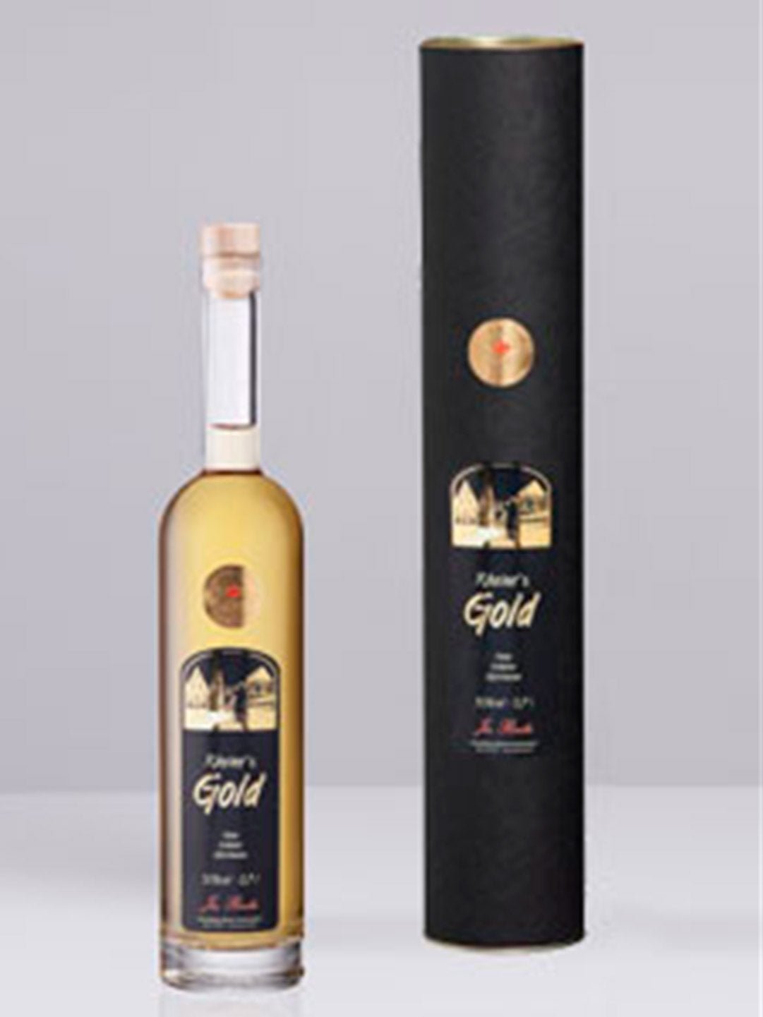 Flasche und Geschenkverpackung von Kirner's Gold Likör mit schlichter schwarzer Etikettgestaltung