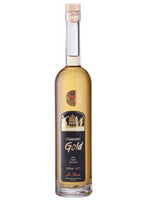 Flasche Meppener Gold Likör mit goldenem Inhalt und schwarzem Etikett