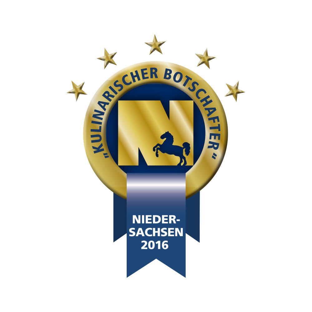 Goldene Medaille mit fünf Sternen und blauem Band, Aufschrift Kulinarischer Botschafter Niedersachsen 2016